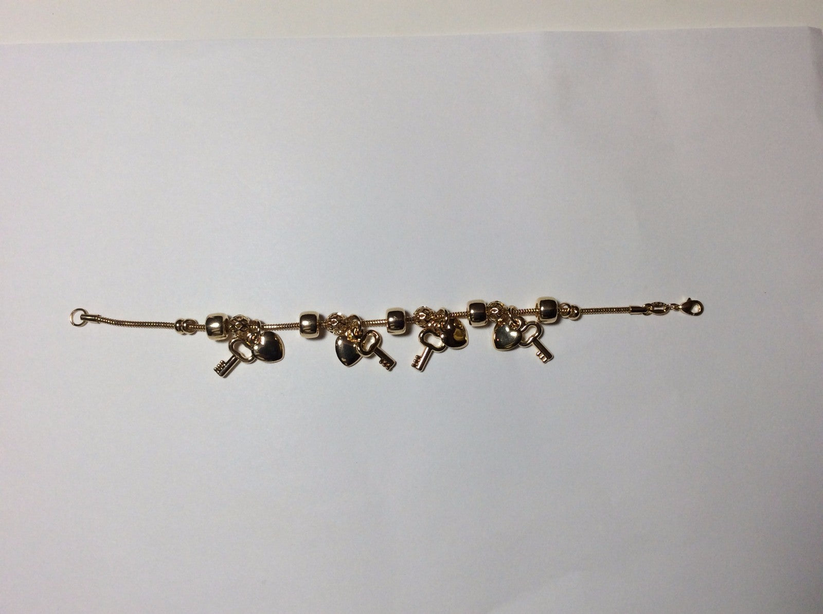 18 KARAT GOLD PLATED HIGH STYLE DESIGNER BRACELETS, 25 STYLES, YOU PICK