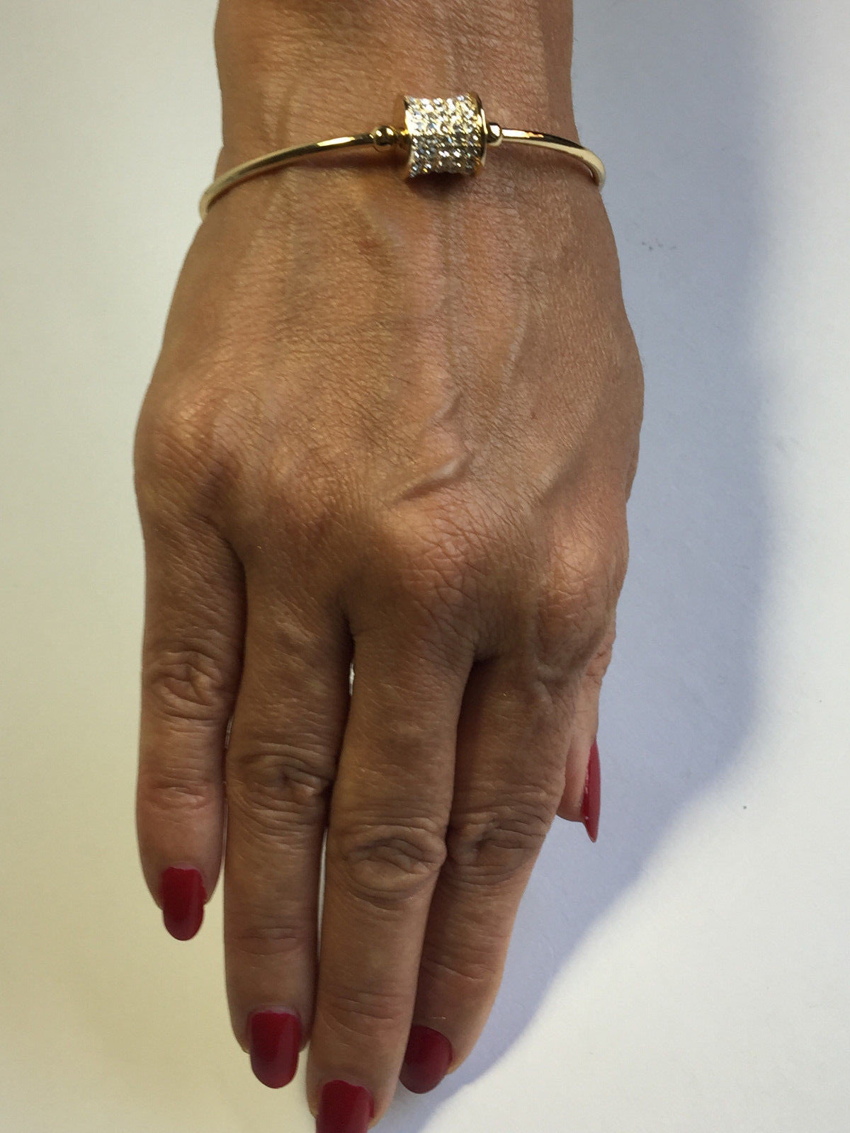 14K GOLD PLATED CUFF BRACELET WITH 5MM BALL ENDS WITH CZ INLAID CHARM J214