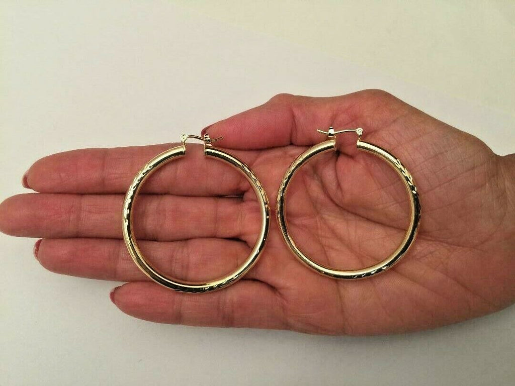 14 K GOLD PLATED HOOPS 3 MM X 48 MM W/ DIAMOND CUTS AND SNAP IN CLOSING J 399