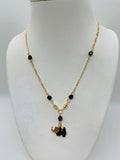 14K GOLD PLATED 18" FIGARO CHAIN W/BLACK BEADS & BLACK & GOLD ELEPHANT CHARM SN2