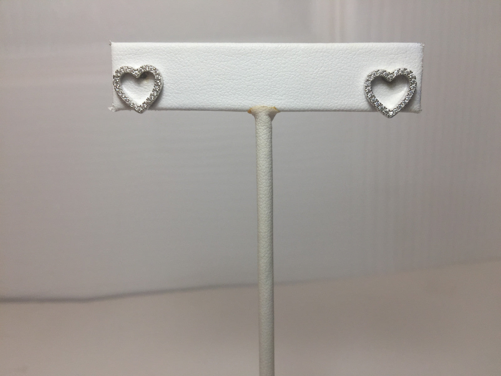 .925 STERLING SILVER OPEN HEART DESIGN STUD EARRINGS W/ MICRO PAVE WHITE CZ J257