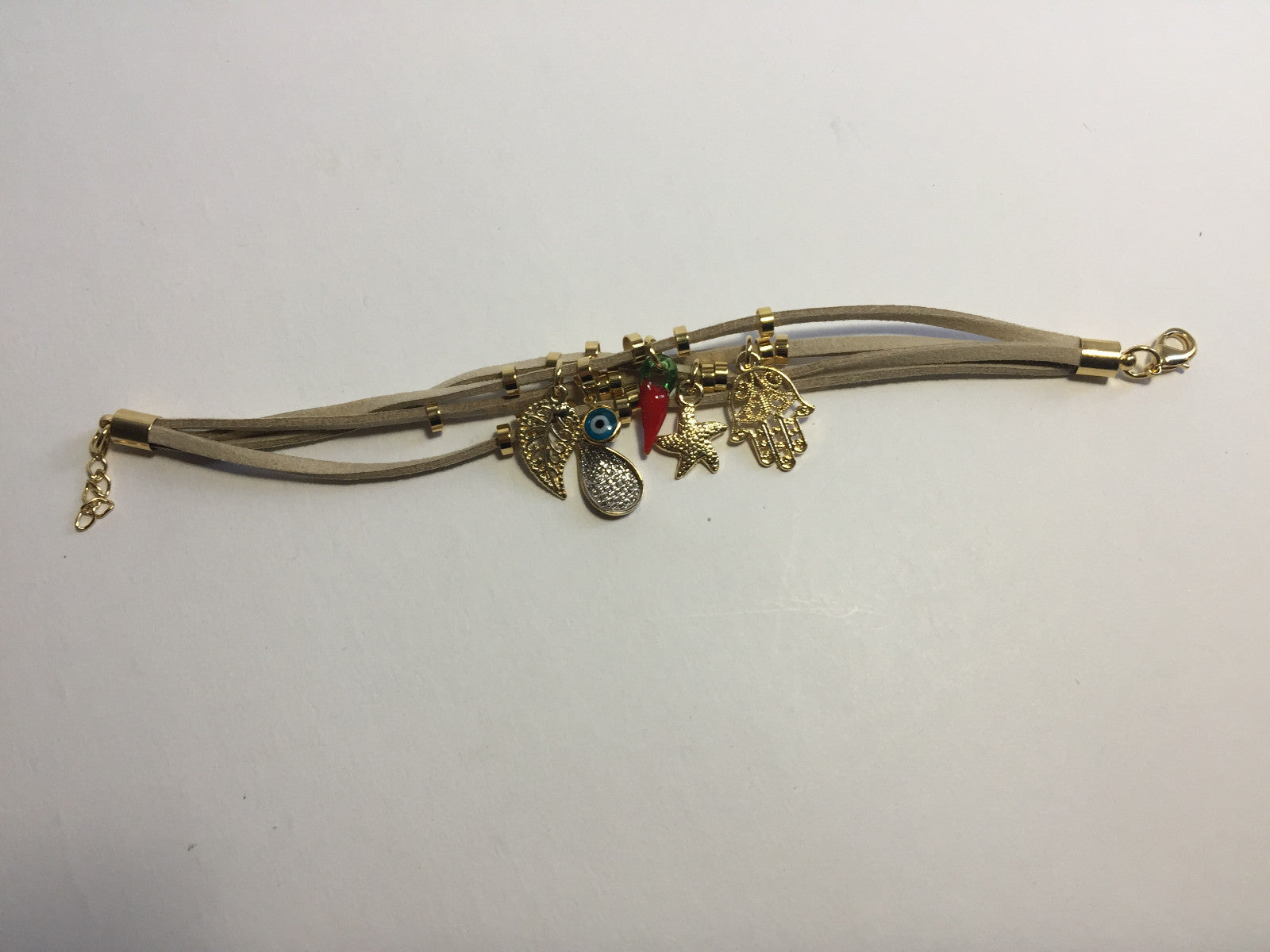 14K GOLD PLATED BRACELET WITH CHARMS DANGLING FROM 4 STRANDS OF BROWN SUEDE J216