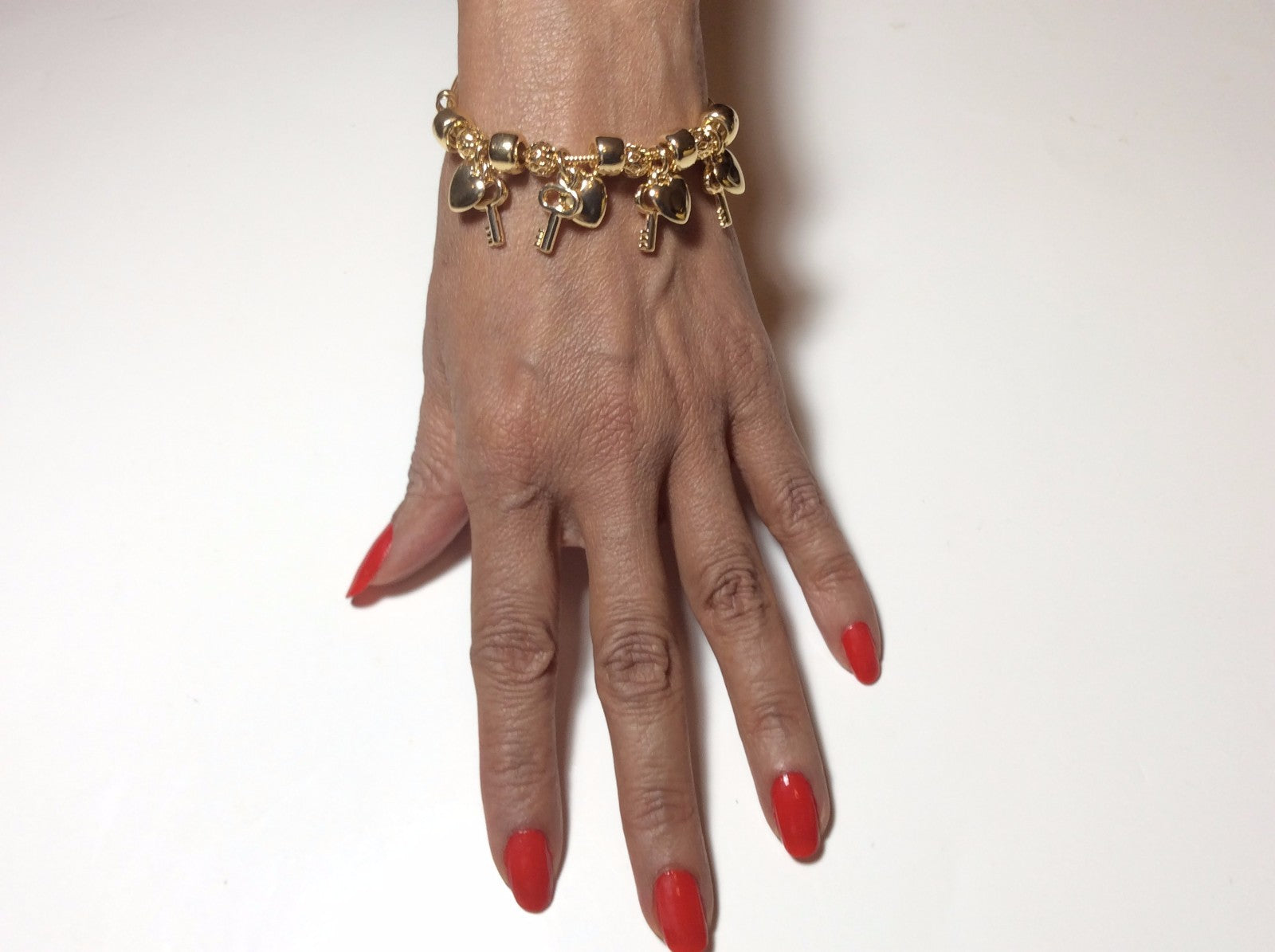 18 KARAT GOLD PLATED HIGH STYLE DESIGNER BRACELETS, 25 STYLES, YOU PICK