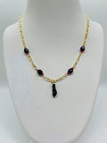 14K GOLD PLATED 18" FIGARO CHAIN WITH BLACK BEADS AND BLACK POWER FIST CHARM SN2