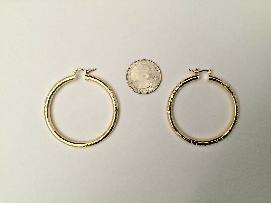14 K GOLD PLATED HOOPS 3 MM X 48 MM W/ DIAMOND CUTS AND SNAP IN CLOSING J 399