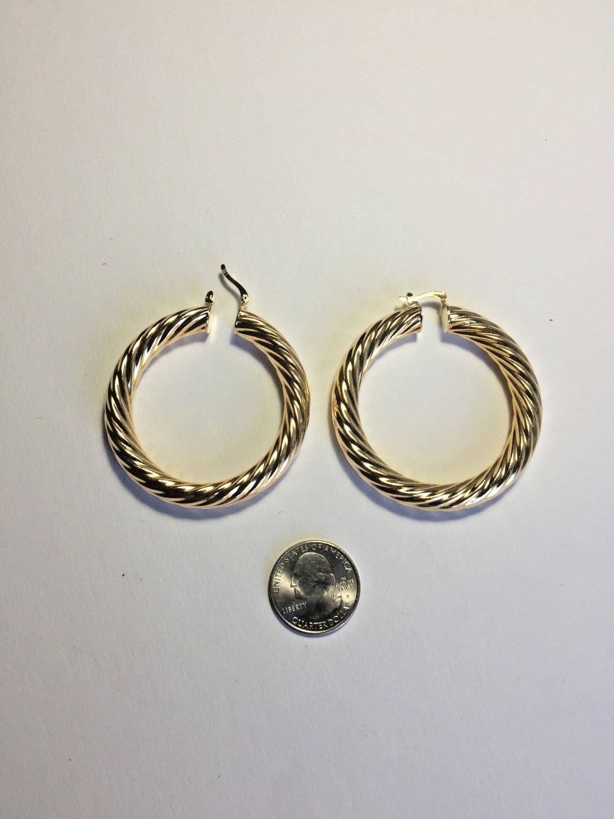 14 K GOLD PLATED TWISTED STYLE HOOP EARRING 7 X 56 MM WITH SNAP IN CLOSING J 164