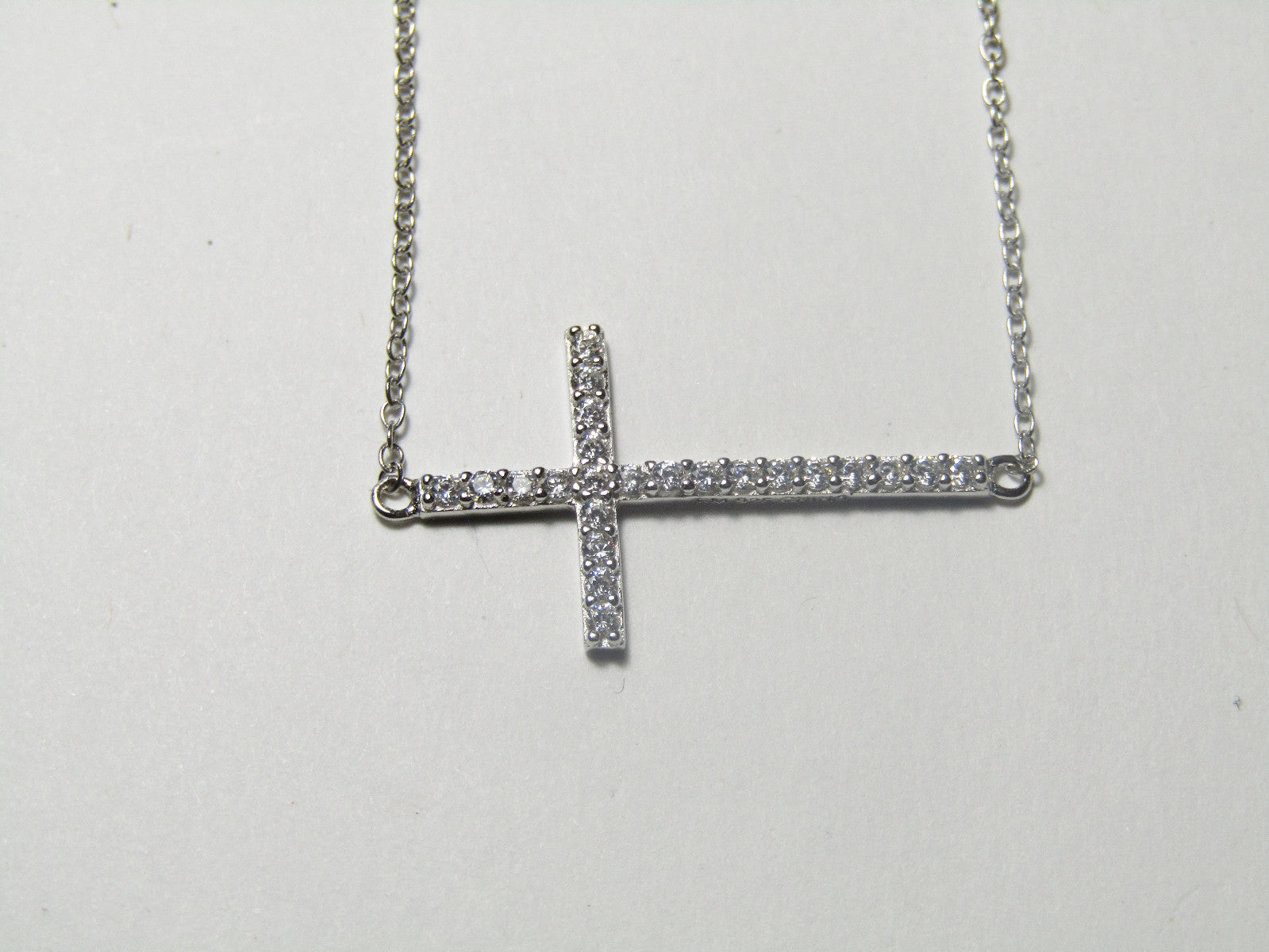 .925 STRERLING SILVER SIDEWAY CROSS WITH CZ 16 INCH CHAIN WITH 2 INCH EXT J 104