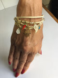 14K GOLD PLATED BRACELET WITH CHARMS DANGLING FROM 4 STRANDS OF BROWN SUEDE J216