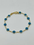 14K GOLD PLATED 7.5" BRACELET WITH 6 MM ROUND AQUA BLUE EVIL EYES LINKED SB15