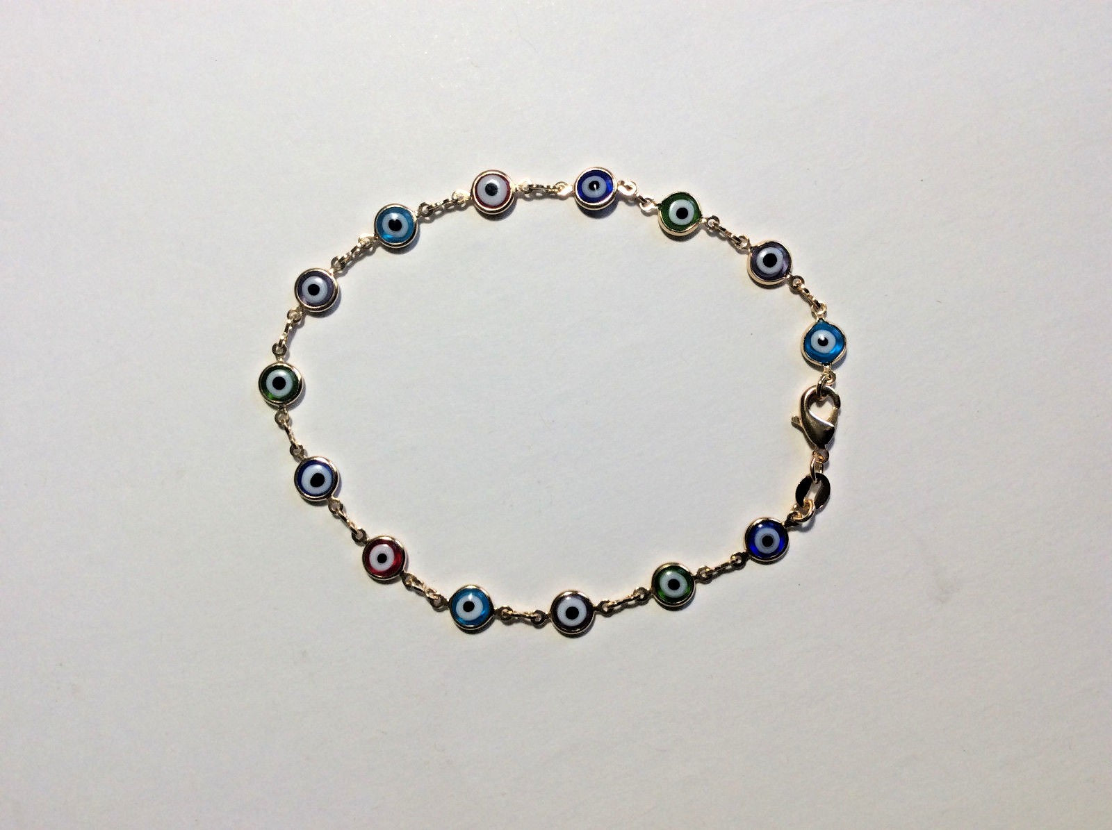 14K GOLD PLATED ANKLET 10 INCH WITH 14 MULTI COLORED EYE CHARMS J131